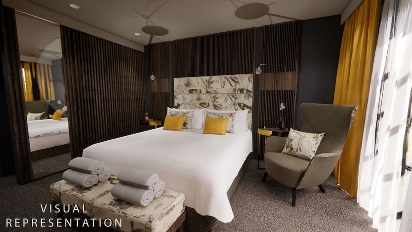 Imagen de la habitación del Hotel The Haycock Manor. Foto 3