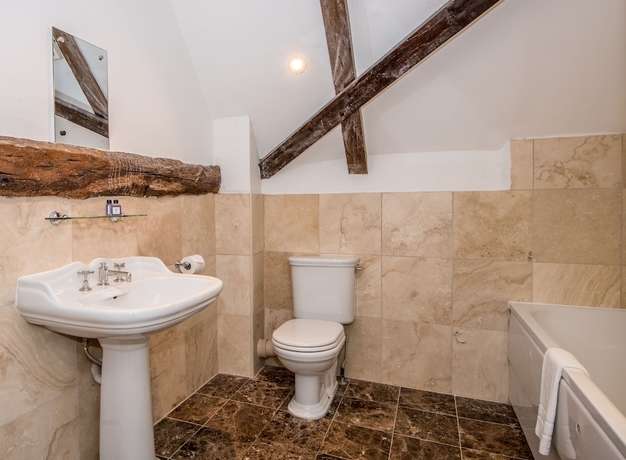 Imagen de la habitación del Hotel The Haycock Manor. Foto 6