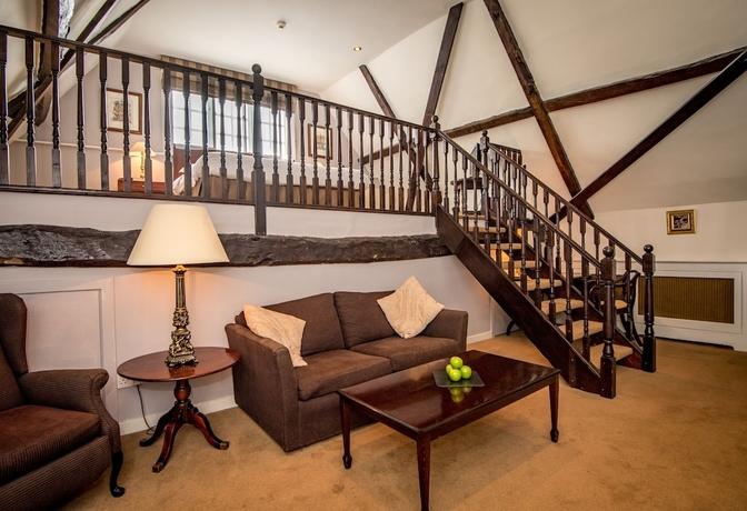 Imagen de la habitación del Hotel The Haycock Manor. Foto 13