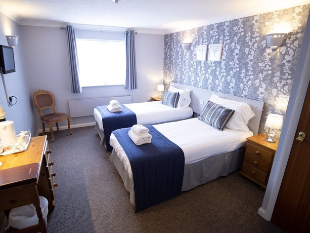 Imagen de la habitación del Hotel The Heath Inn. Foto 4