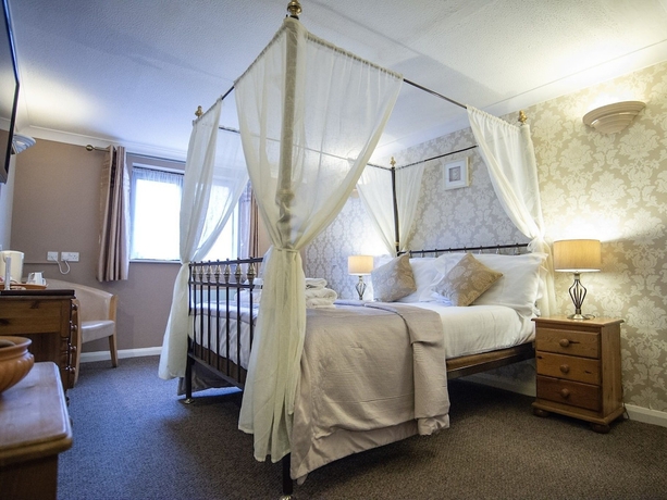 Imagen de la habitación del Hotel The Heath Inn. Foto 10