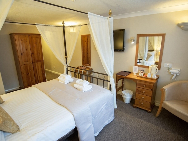 Imagen de la habitación del Hotel The Heath Inn. Foto 11