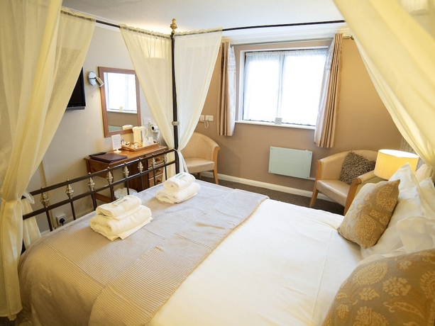 Imagen de la habitación del Hotel The Heath Inn. Foto 17