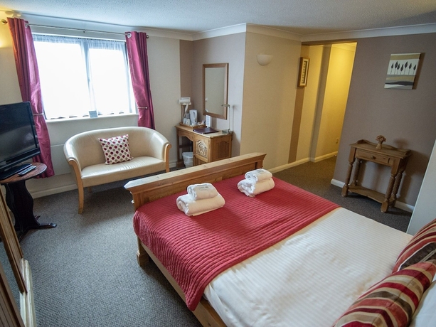 Imagen de la habitación del Hotel The Heath Inn. Foto 18