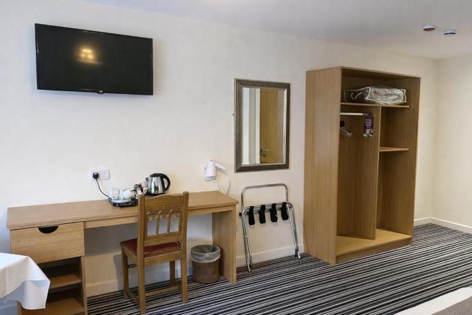 Imagen de la habitación del Hotel The Hedges. Foto 10