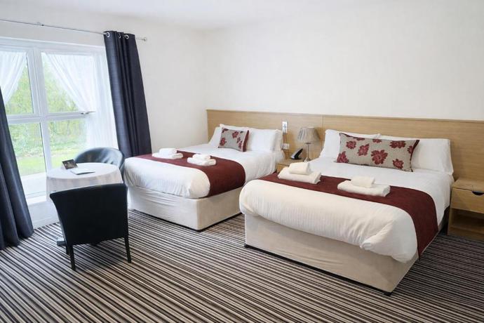 Imagen de la habitación del Hotel The Hedges. Foto 16