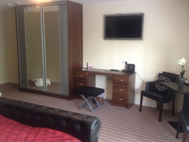 Imagen de la habitación del Hotel The Hedges. Foto 9