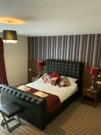 Imagen de la habitación del Hotel The Hedges. Foto 12