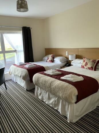 Imagen de la habitación del Hotel The Hedges. Foto 15