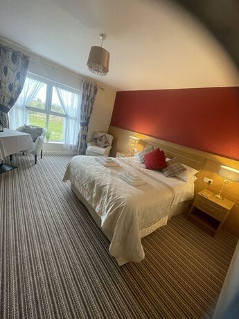 Imagen de la habitación del Hotel The Hedges. Foto 17