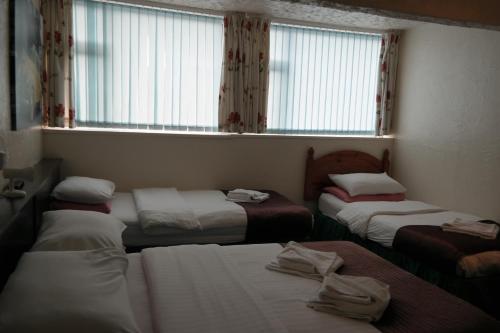 Imagen de la habitación del Hotel The Helmshore. Foto 6