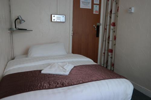 Imagen de la habitación del Hotel The Helmshore. Foto 7