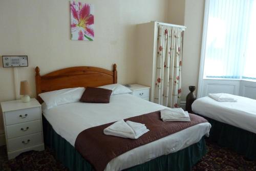 Imagen de la habitación del Hotel The Helmshore. Foto 9