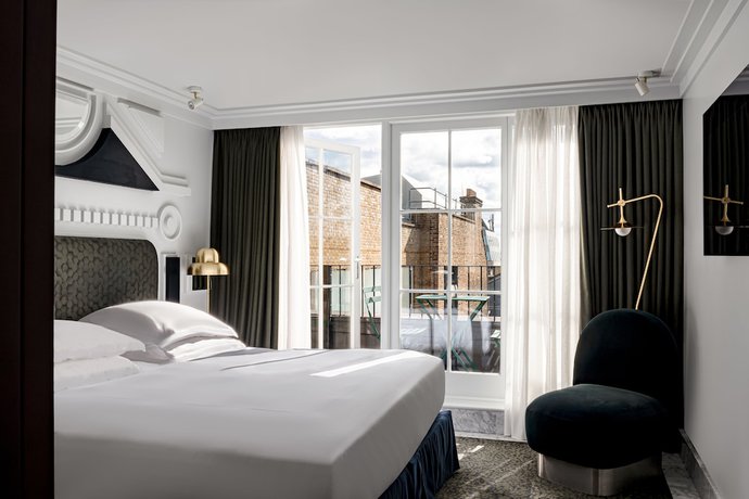 Imagen de la habitación del Hotel The Henrietta. Foto 14