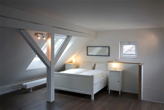 Imagen de la habitación del Hotel The Henry. Foto 9