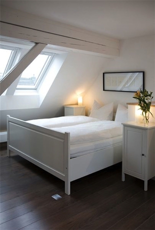 Imagen de la habitación del Hotel The Henry. Foto 10