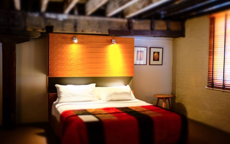 Imagen de la habitación del Hotel The Henry Jones Art. Foto 3