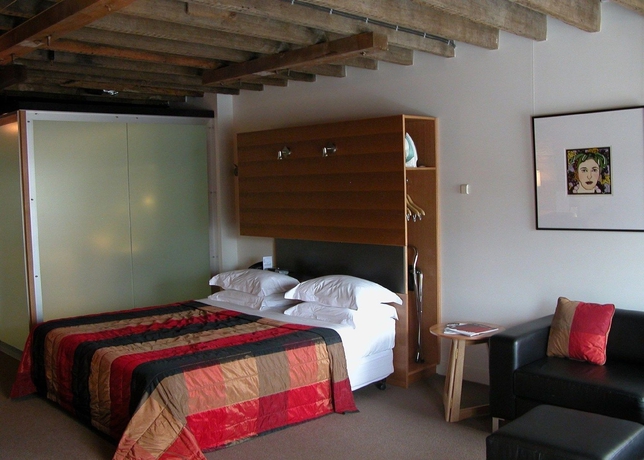 Imagen de la habitación del Hotel The Henry Jones Art. Foto 4