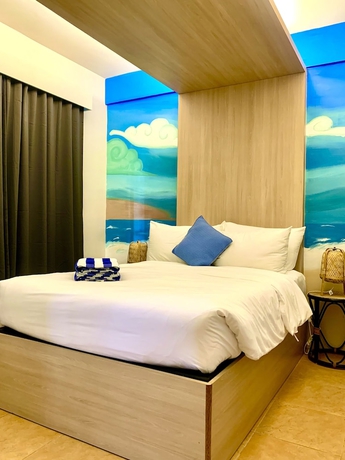 Imagen de la habitación del Hotel The Henry Resort Taramindu Laiya. Foto 6