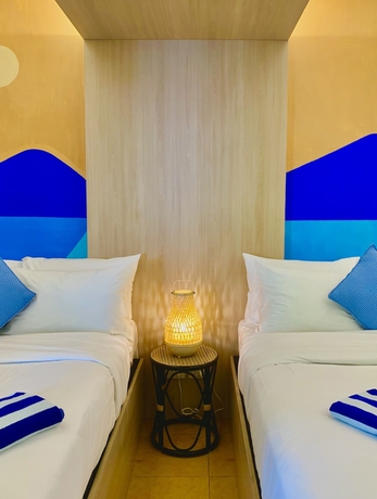 Imagen de la habitación del Hotel The Henry Resort Taramindu Laiya. Foto 8