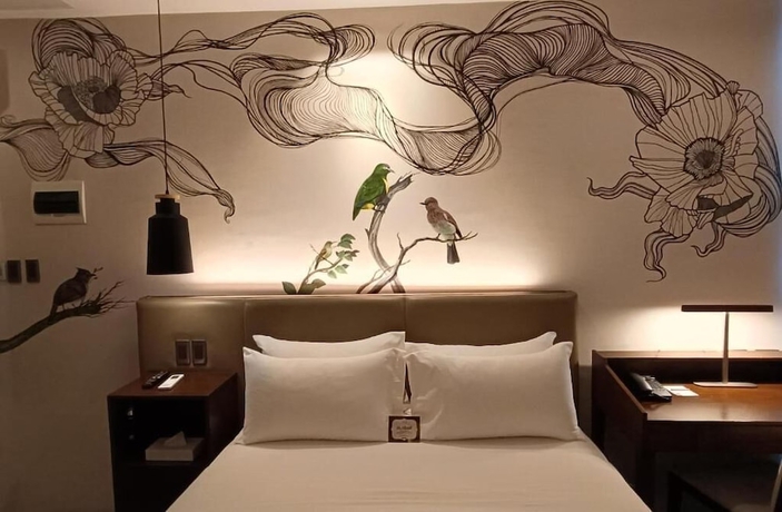 Imagen de la habitación del Hotel The Henry Roost Bacolod. Foto 2