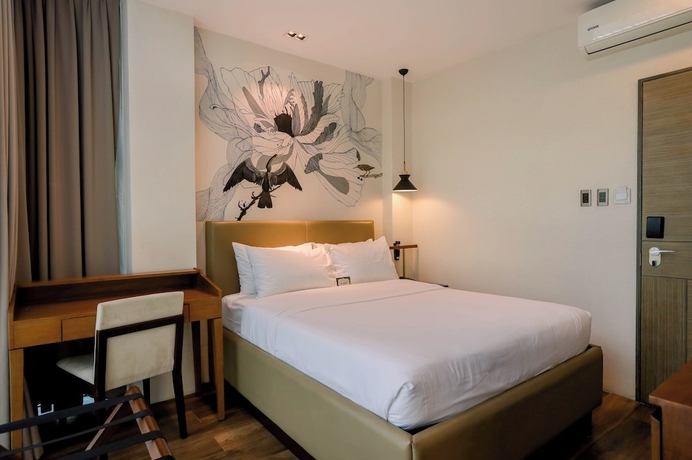 Imagen de la habitación del Hotel The Henry Roost Bacolod. Foto 3