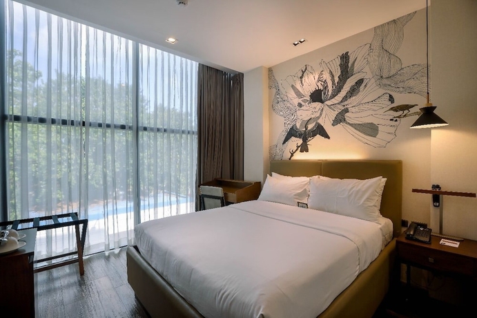 Imagen de la habitación del Hotel The Henry Roost Bacolod. Foto 8