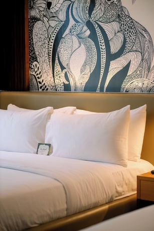 Imagen de la habitación del Hotel The Henry Roost Bacolod. Foto 9