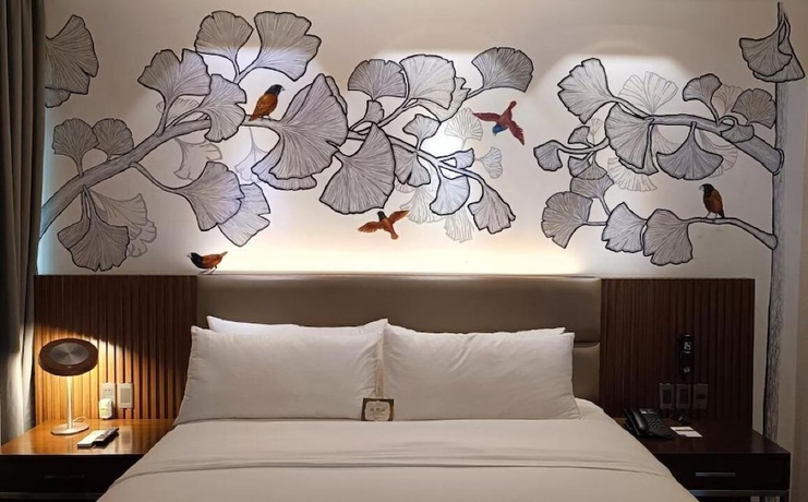 Imagen de la habitación del Hotel The Henry Roost Bacolod. Foto 11