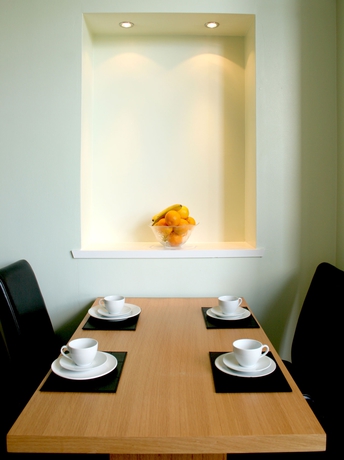 Imagen del bar/restaurante del Hotel The Heritage. Foto 2