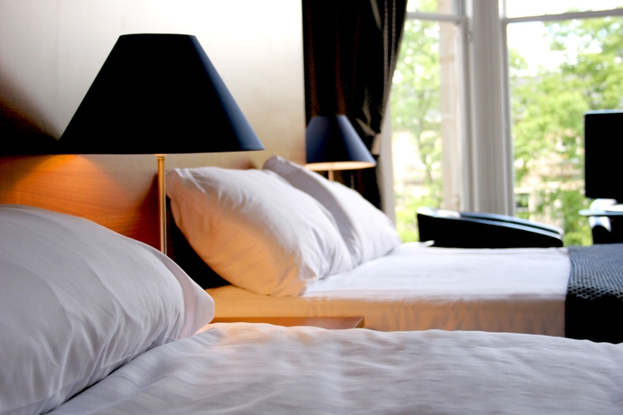 Imagen de la habitación del Hotel The Heritage. Foto 9