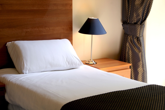 Imagen de la habitación del Hotel The Heritage. Foto 10