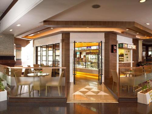 Imagen del bar/restaurante del Hotel The Heritage Grand Khon Kaen Hotel and Convention. Foto 13