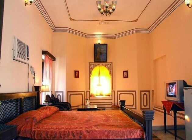 Imagen de la habitación del Hotel The Heritage Mandawa-a Luxury. Foto 14