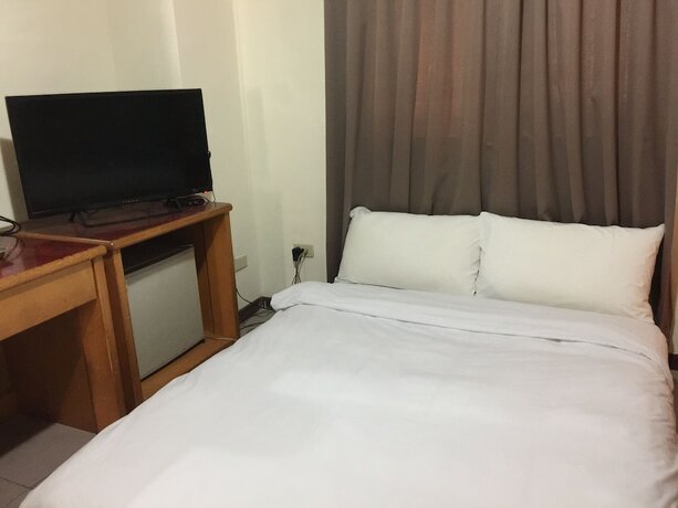 Imagen de la habitación del Hotel The Hermit Inn. Foto 24