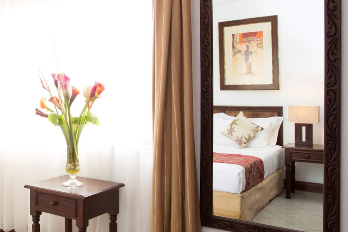 Imagen de la habitación del Hotel The Heron. Foto 8