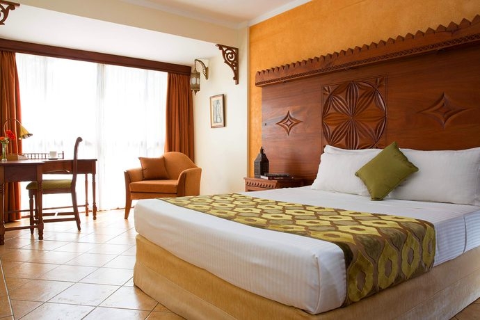 Imagen de la habitación del Hotel The Heron. Foto 9