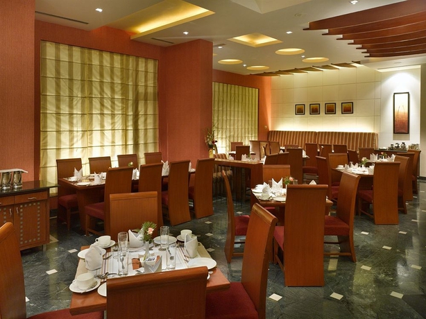 Imagen del bar/restaurante del Hotel The Hhi. Foto 3