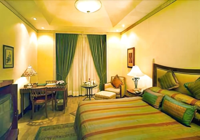Imagen de la habitación del Hotel The Hhi Kolkata. Foto 6
