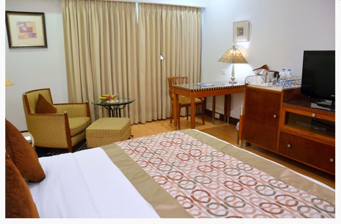 Imagen de la habitación del Hotel The Hhi Kolkata. Foto 11