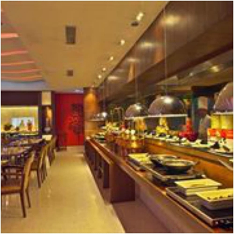 Imagen del bar/restaurante del Hotel The Hhi Kolkata. Foto 2