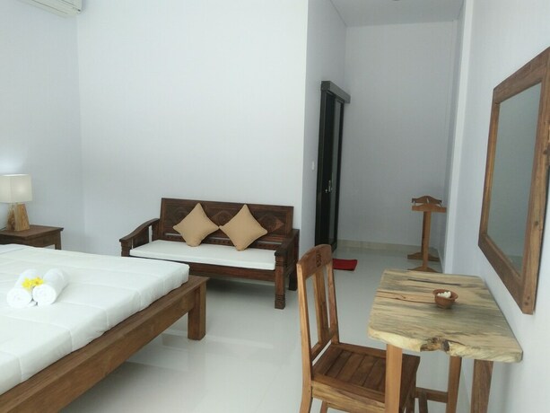 Imagen de la habitación del Hotel The Hidden Bali Inn. Foto 25