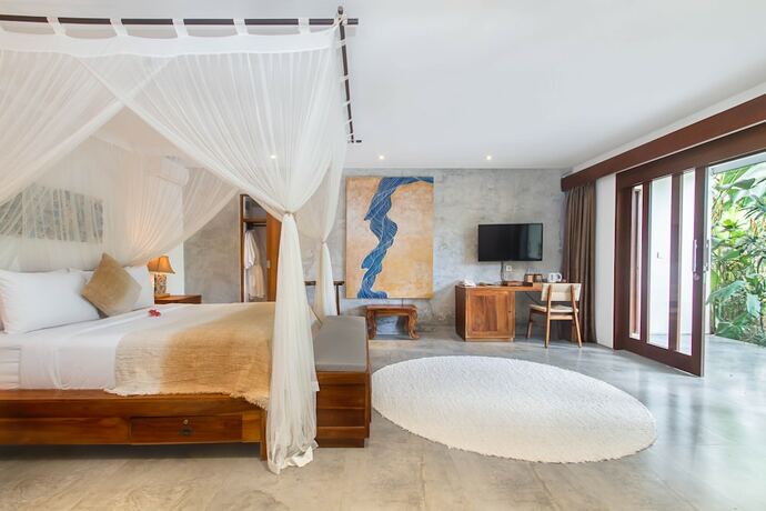 Imagen de la habitación del Hotel The Hidden Paradise Ubud. Foto 17