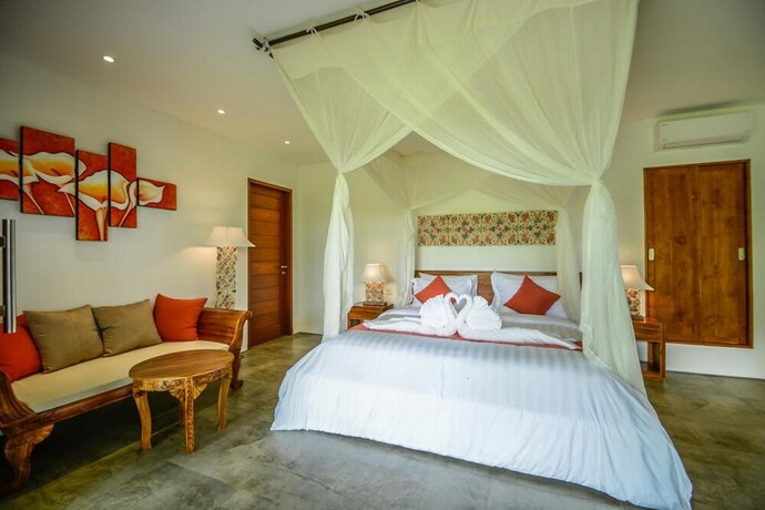 Imagen de la habitación del Hotel The Hidden Paradise Ubud. Foto 18