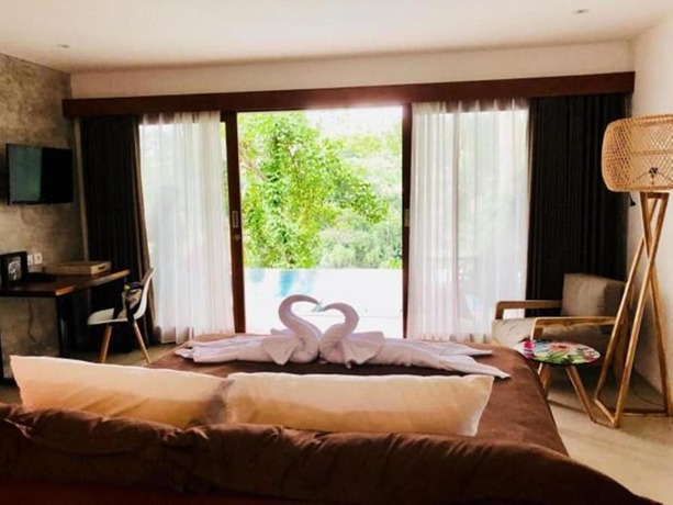 Imagen de la habitación del Hotel The Hidden Paradise Ubud. Foto 21