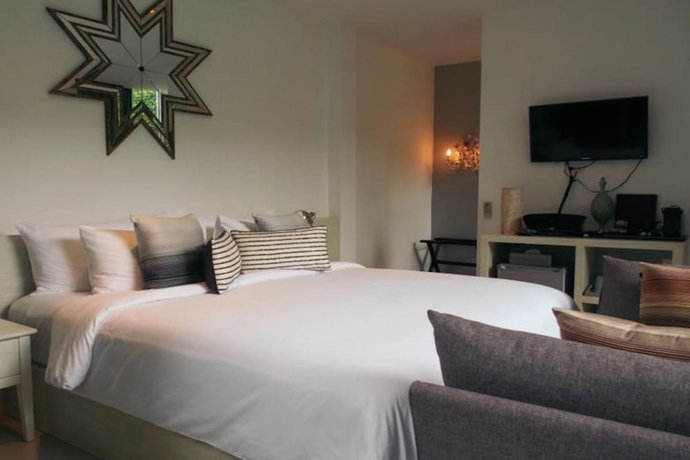 Imagen de la habitación del Hotel The Hidden Resort and Restaurant. Foto 9