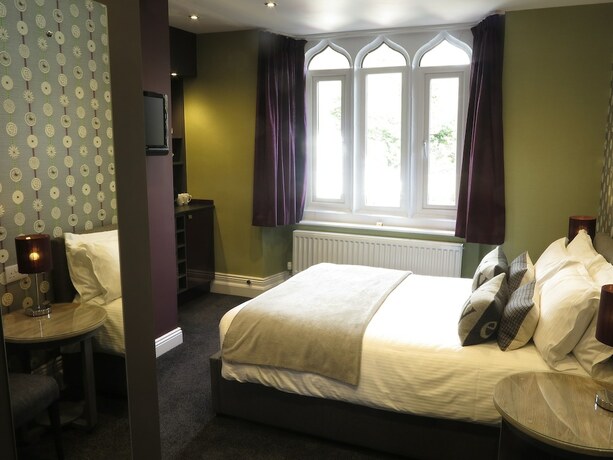 Imagen de la habitación del Hotel The Hideaway at Windermere. Foto 16