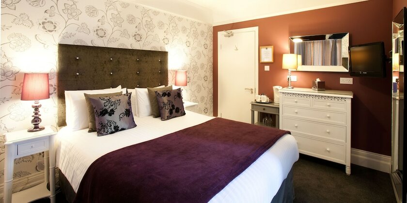 Imagen de la habitación del Hotel The Hideaway at Windermere. Foto 18