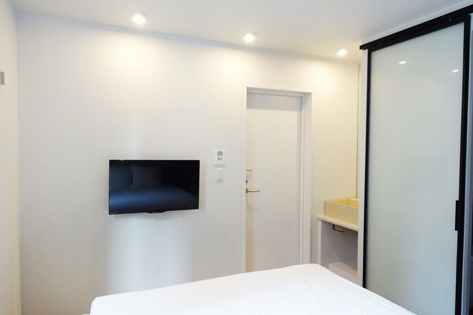 Imagen de la habitación del Hotel The Hideout Tokyo. Foto 19