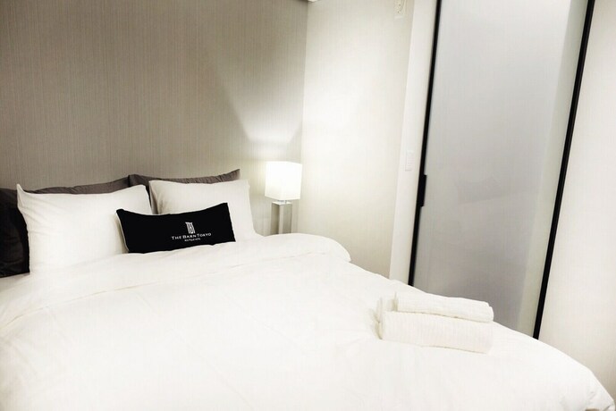 Imagen de la habitación del Hotel The Hideout Tokyo. Foto 22